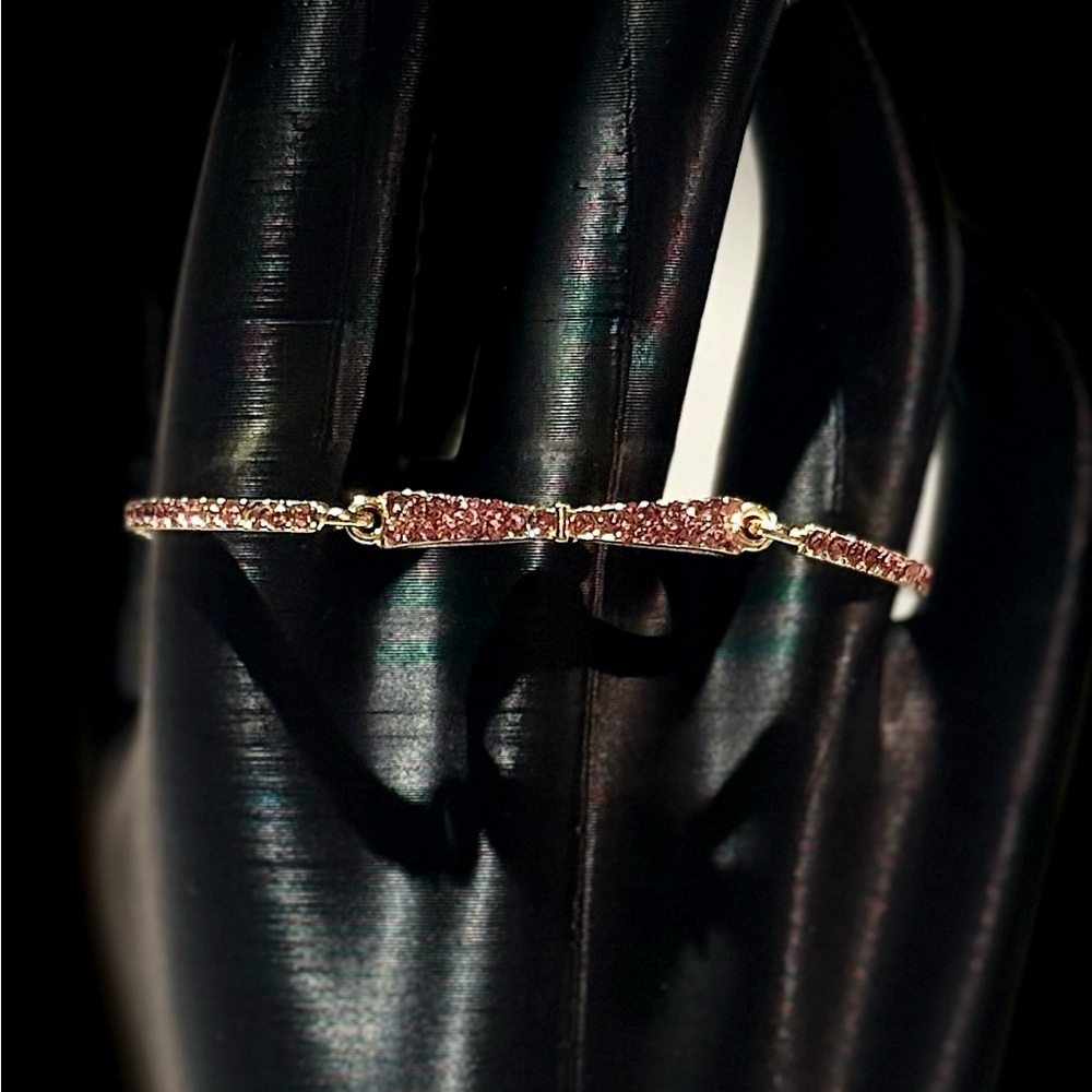 Elegant Gold and Pink Bow Bracelet
